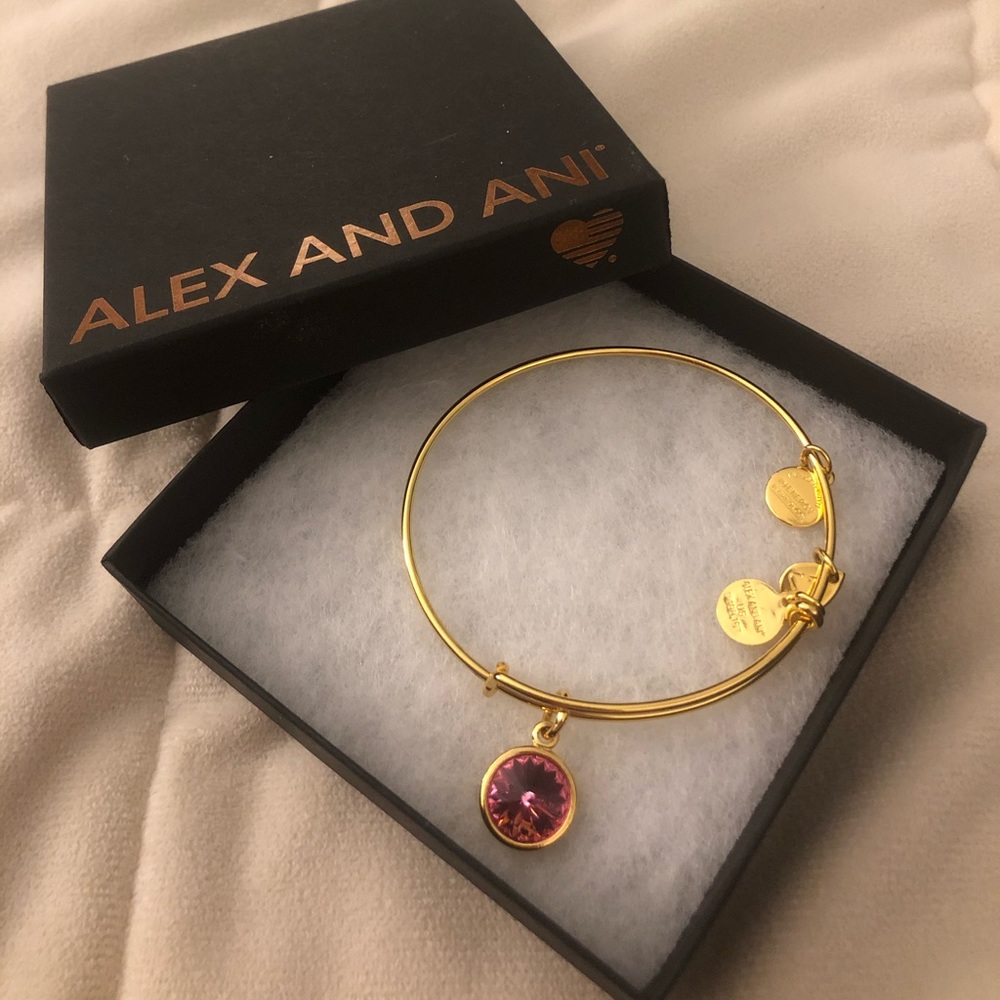 Alex and Ani Swarovski gold bangle with rose charm